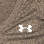 Under Armour  v-neck short sleeved women’s shirt size medium Photo 2