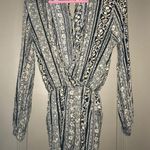 Honey Punch Black and gold patterned romper Photo 0