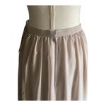 Christina Wu NWT--TWO PIECE TAUPE FORMAL SET-SIZE 10 Stunning lace sleeveless top, fully lined, buttons down the back, long flowy skirt, fully lined, back zip, a beautiful two piece set, perfect for wedding, prom, any formal occasion, brand new with tags. Measurements: Top: Bust: armpit to armpit 20 inches  Length: shoulder seam to bottom 17 inches  Skirt: Waist: side to side 15 inches  Length: waistband to bottom 45 inches Photo 3