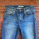 Levi's 721 HIGH RISE SKINNY RIPPED KNEE JEANS Photo 1