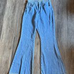 Princess Polly  Light Blue High Waist Raw Hem Flare Leg Jeans Size 4 Photo 0