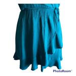 Altar'd State beautiful green faux wrap dress, flutter sleeves, fully lined, excellent condition. Size xs Measurements: Bust: armpit to armpit 15 inches Waist: side to side 11-15 inches Length: shoulder seam to bottom 29 1:2 inches Photo 4