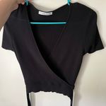Francesca's Cropped Black Wrap Top Photo 5