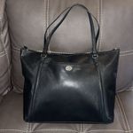 Coach shoulder bag preowned handles are cracking just at the shoulder area Photo 0