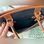 Dooney & Bourke Vintage Buckle Black/Tan Pebbled All Weather Leather purse Photo 7