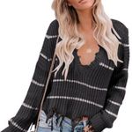 Andrée 108. Andree by Unit Distressed V Neck Raw Hemline Sweater Photo 0