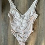 Victoria's Secret Victoria’s Secret Lace Bodysuit in Cream Photo 0