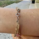 Triple Strand Yellow Gold colored and Rose Pink Bracelet Photo 1
