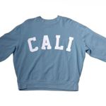 Baggy light blue graphic “CALI” sweatshirt (Size M) Size M Photo 0
