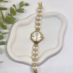 Dainty Gold Tone Pearl Watch Photo 0