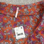 Free People NEW NWT  nina printed top in tulip ditsy orange floral bell sleeve Photo 6