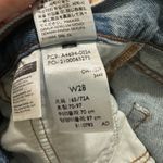 Levi's | Blue Denim Icon Frayed Hem Cutoff Mini Skirt Photo 4