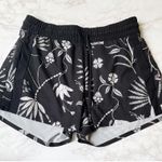 Athleta Baja Printed Shorts Black Wildflower Drawstring Unlined 2 Photo 1