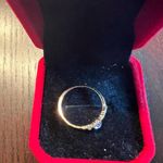 Dainty White Gold Diamond Ring with Accent Stones Photo 2
