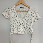 Brandy Melville MOVING SALE -  Blue floral print wrap tshirt crop top Photo 2