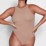 SKIMS  High Neck Thong Bodysuit Photo 0