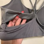 Fabletics  metallic gray padded woman sport bra size LARGE criss cross back Photo 4