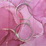 Round hoop silver tone earrings Photo 0