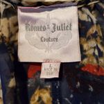 Romeo + Juliet Couture Blouse is in great condition, no flaws. See threw in material. Photo 2