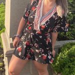 Maurice's Black Floral V Neck Romper Photo 1