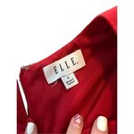Elle  | Red polka dot dress Photo 7