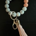 NWOT silicone key ring ring wristlet Gray and Peach Photo 1