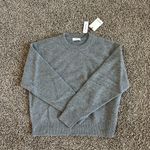Aritzia Cashmere Relaxed Crew Sweater in heather dark grey, size medium Photo 1