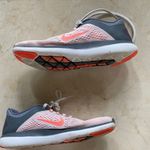 Nike  Woman’s Sz 8.5 Orange/Gray Sneakers Photo 0