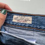 Levi's 501 Mid-Rise Distressed Jeans Photo 3