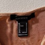 Forever 21 NWT gold shimmer bodysuit - Size SMALL Photo 1