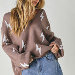 These Three Boutique  lightning bolt oversized sweater Photo 0