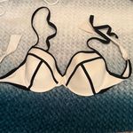 Xhilaration  Bikini Top, size D/DD black and white.


Super cute, halter tie Photo 0