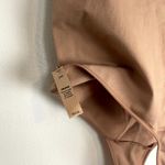 SKIMS Crewneck Sleeveless Bodysuit in Tigers Eye Size XX-Small / X-Small Photo 4