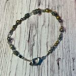 Beaded Bracelets in Black, Gold, and Silver Photo 3