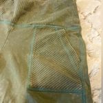Aeries medium biker shorts. Like new grayish green color Photo 2