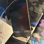 “Strapless dress with an abstract print in shades of blue, purple, and black. Blue Size 4 Photo 4