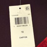 Connected Apparel Dress -  - Sz 10 - some stretch in this dress - gorgeous red roses on black - flowy chiffon - ruffled front from waist to hem, ties at waist. V neck. Faux wrap. 3/4 length sleeves. New! Never worn. Photo 3