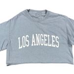 Brandy Melville  - Cropped Los Angeles Tee in Blueish Gray Photo 0