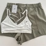 Gymshark Scallop Hem Shaped Shorts & Ruched Strappy Sports Bra Set Photo 0