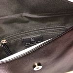 B-low the Belt Studded Clutch Photo 2