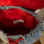 Icing Y2K light wash distressed mini backpack with American flag appliqué. NWOT Photo 2