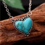Cute cowgirl/western style silver chain with cute turquoise heart center… Photo 0