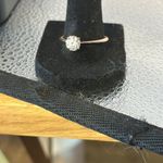 Moissanite 3/4 of a carrot platinum over sterling silver with gold. Size 10 1/4. Photo 3