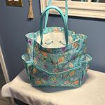 Floral Teal Tote Bag with lots of pockets. By World Market Blue Photo 0