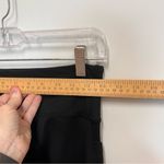 Strut this Revolve “Make Sweat Sexy” Cropped Black Leggings size medium Photo 9