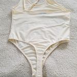 We Wore What  Women's Asymmetrical Thong Bodysuit Ivory Size L Photo 4