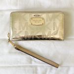 Michael Kors gold metalic tote bag and wallet set Photo 6