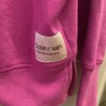 Calvin Klein  Performance Crop Hoodie size medium. 60%, cotton, 40% polyester. Photo 5
