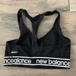 New Balance  black sports bra Photo 1