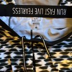 Nike  dri-fit size large Run Fast Live Fearless leggings excellent shape Photo 4